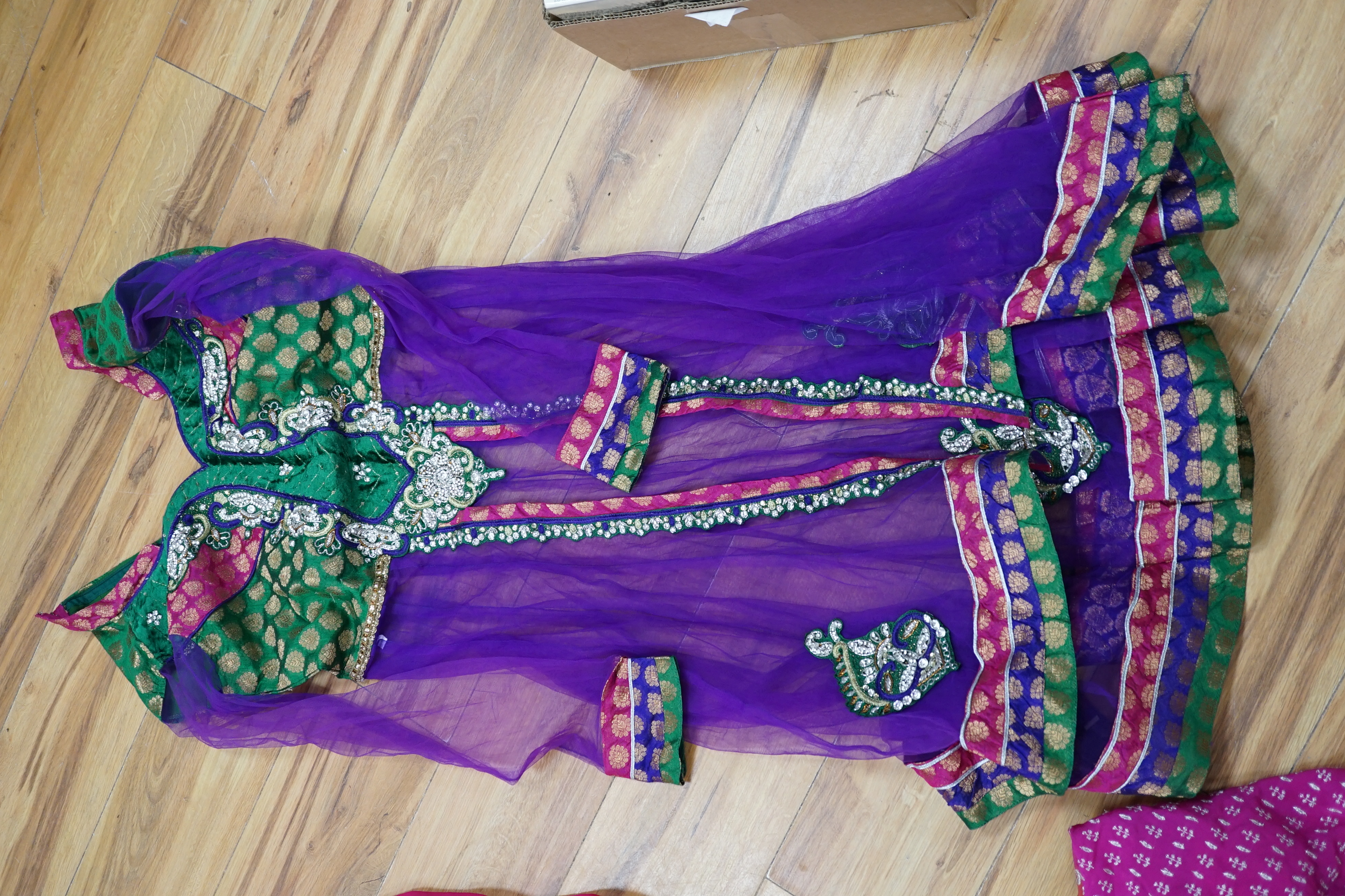 A collection of Indian silk saris and costume possibly bridal